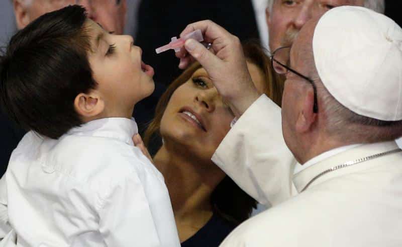 Pope Francis gives vaccine