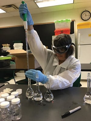 Ann Klotz from Siena College analyzes water samples for bacteria