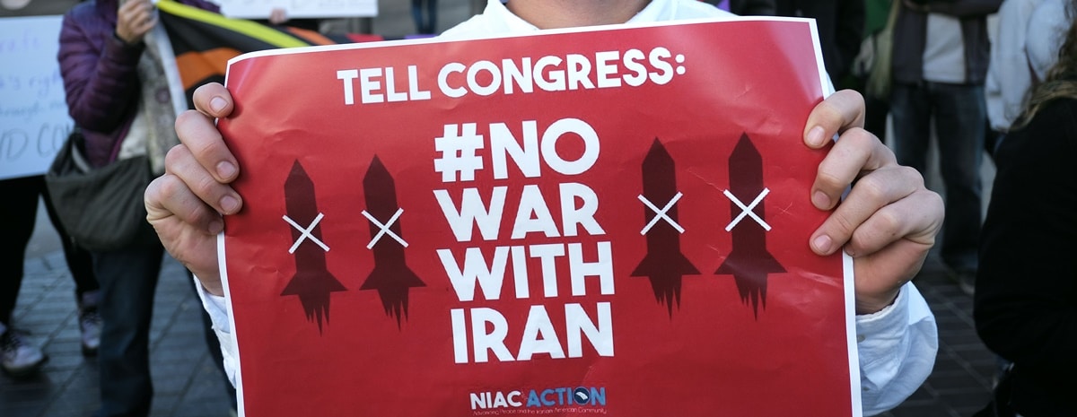 A man participates in a rally Dec. 4, 2020, in San Diego to protest after Iranian Maj. Gen. Qassem Soleimani was killed in a U.S. drone airstrike at Baghdad International Airport the previous day.