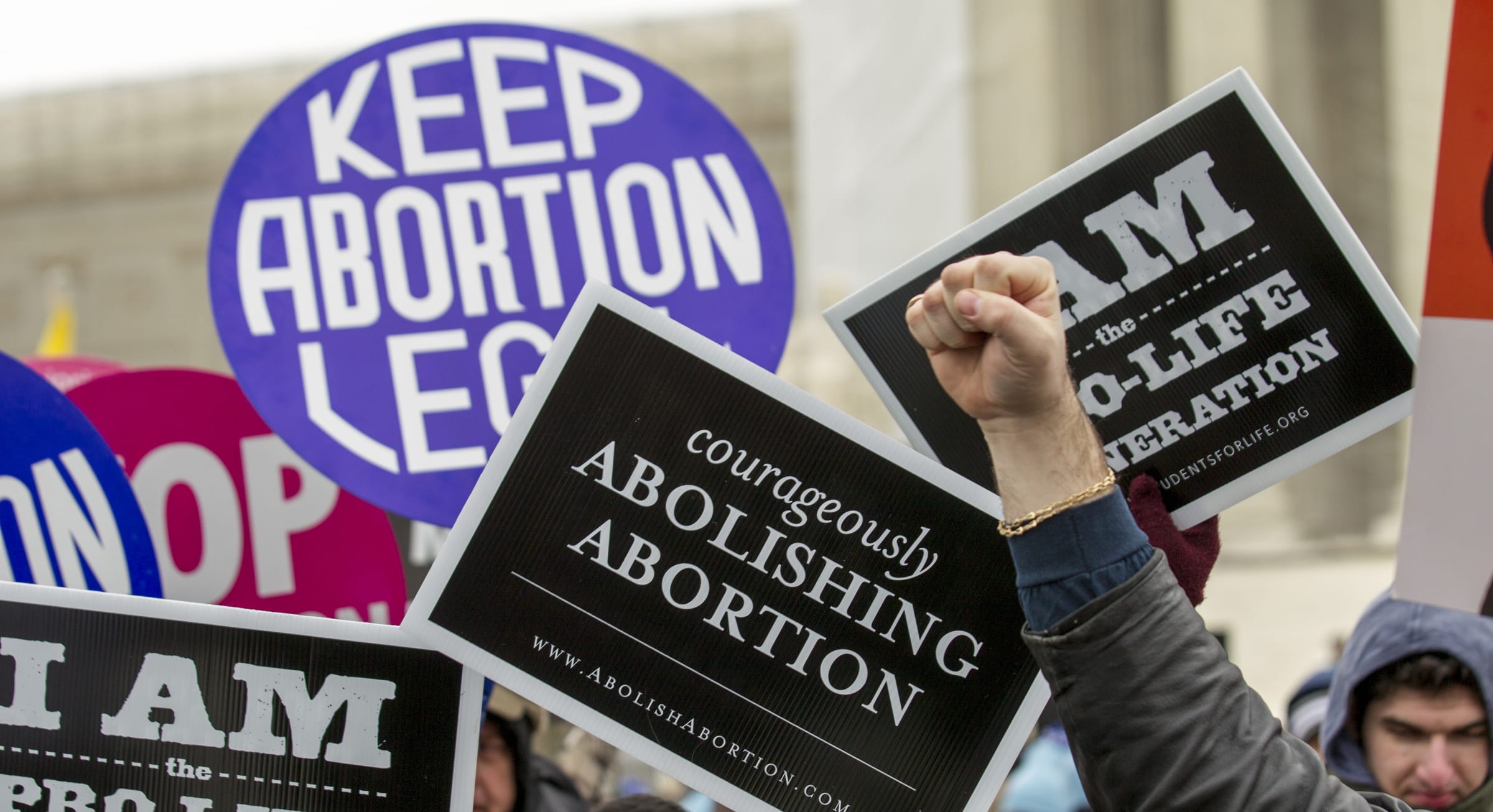 Opposing sides of abortion issue collide in front of Supreme Court