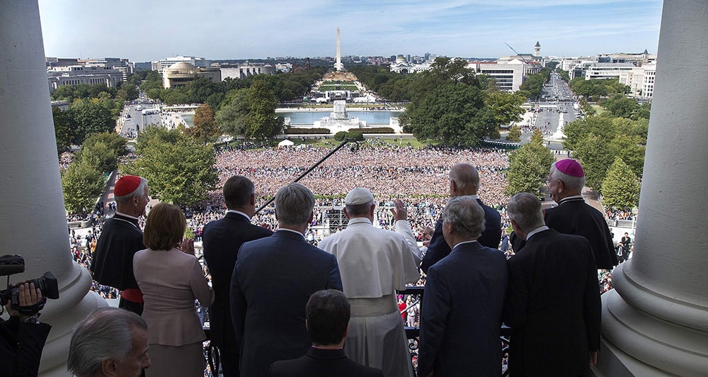 Pope Francis is welcomed to Speakers Balcony at the U.S. Capitol by members of Congress