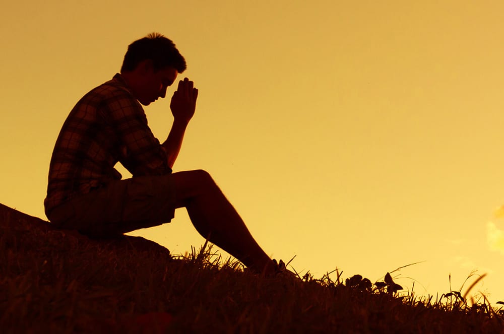 man praying