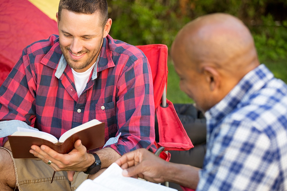 Men having a bible study.