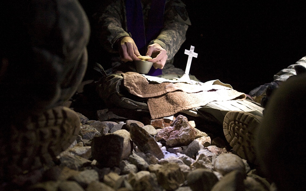 ARMY CHAPLAIN CELEBRATES MASS AT FORWARD OPERATING BASE IN AFGHANISTAN IN 2009