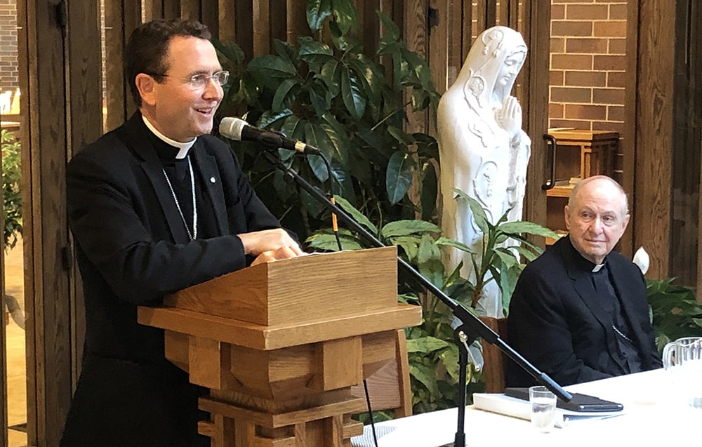 AUXILIARY BISHOP ANDREW H. COZZENS