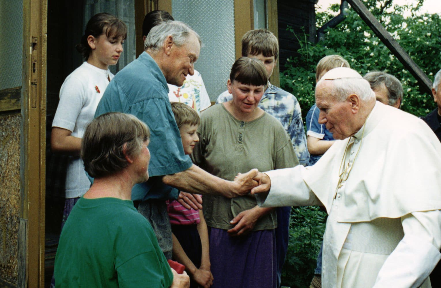 FAMILY GREETS POPE IN UNEXPECTED VISIT