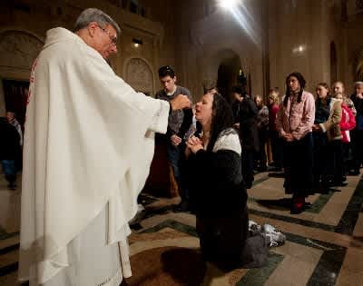 Hand or tongue? Kneeling or standing? Either way, receiving the ...