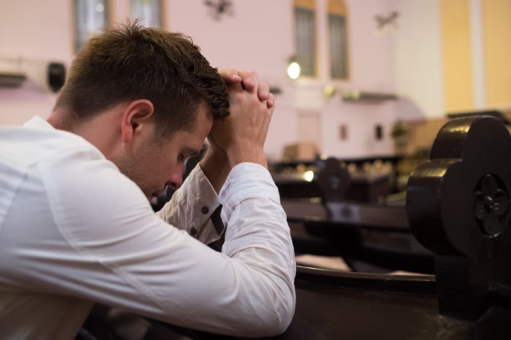 man praying