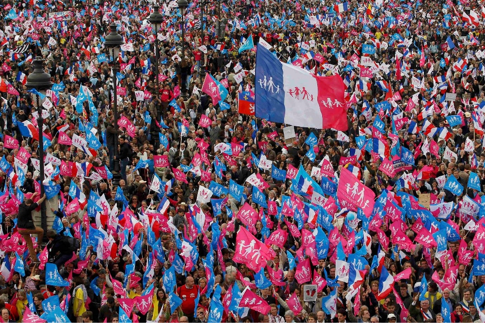 People attend a protest march against France's legalization of same-sex marriage in Paris