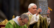 POPE BENEDICT HOLDS BOOK OF GOSPELS DURING SYNOD MASS AT VATICAN