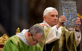 POPE BENEDICT HOLDS BOOK OF GOSPELS DURING SYNOD MASS AT VATICAN