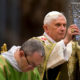 POPE BENEDICT HOLDS BOOK OF GOSPELS DURING SYNOD MASS AT VATICAN