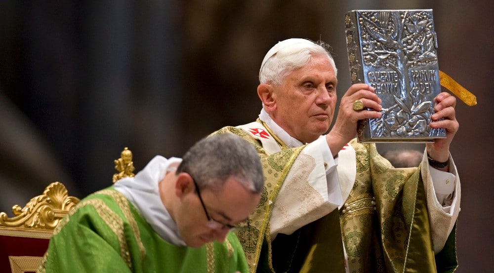 POPE BENEDICT HOLDS BOOK OF GOSPELS DURING SYNOD MASS AT VATICAN