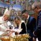 Pope baptizes babies