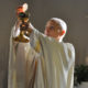Priest healing Lourdes