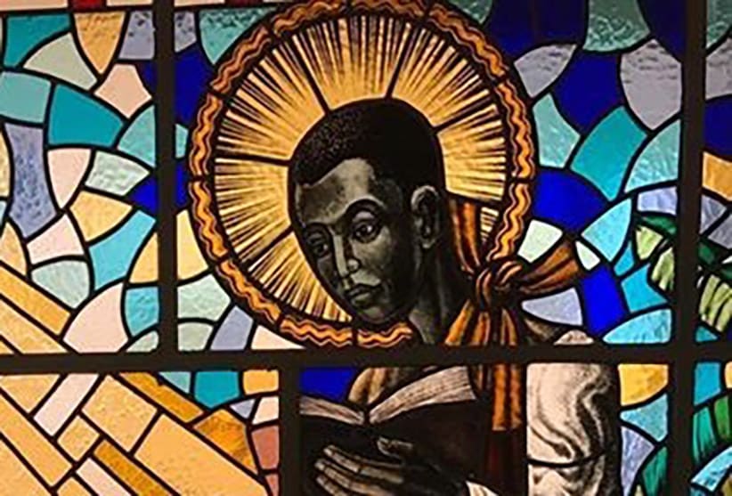 Stained glass image of St. Charles Lwanga.