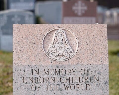A memorial stone dedicated to the unborn children of the world is seen at St. Patrick Parish Cemetery in Smithtown N.Y.