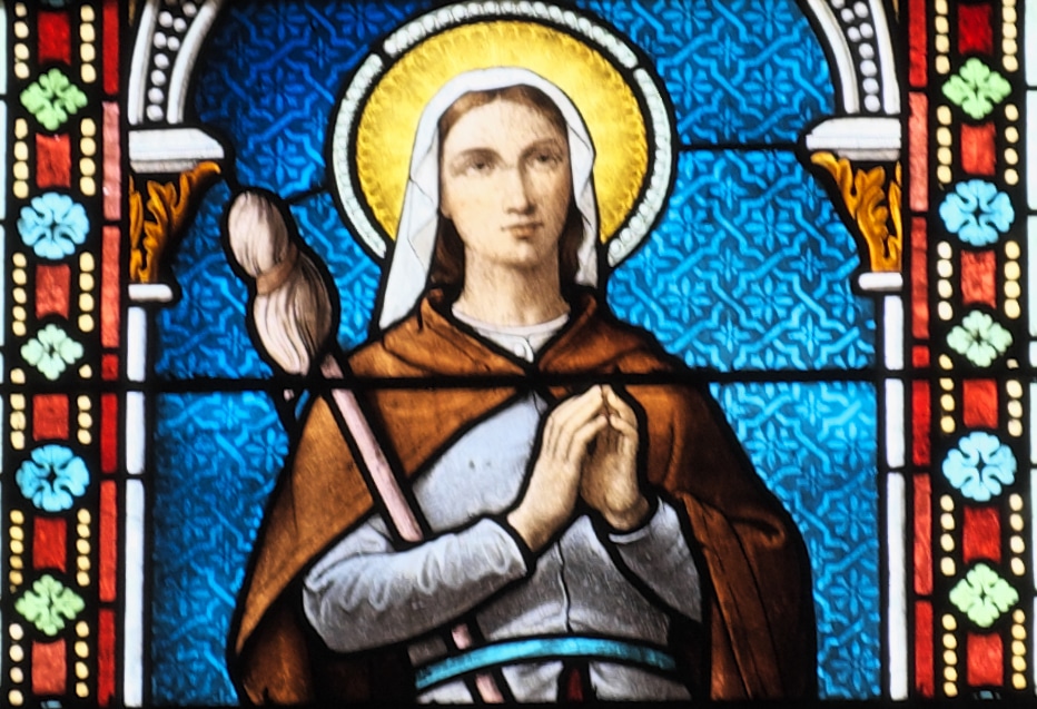 A stained glass image of St. Germaine Cousin