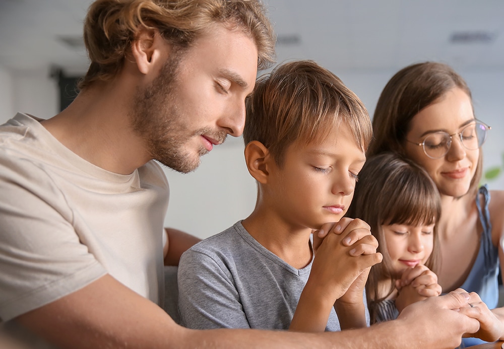 family prays