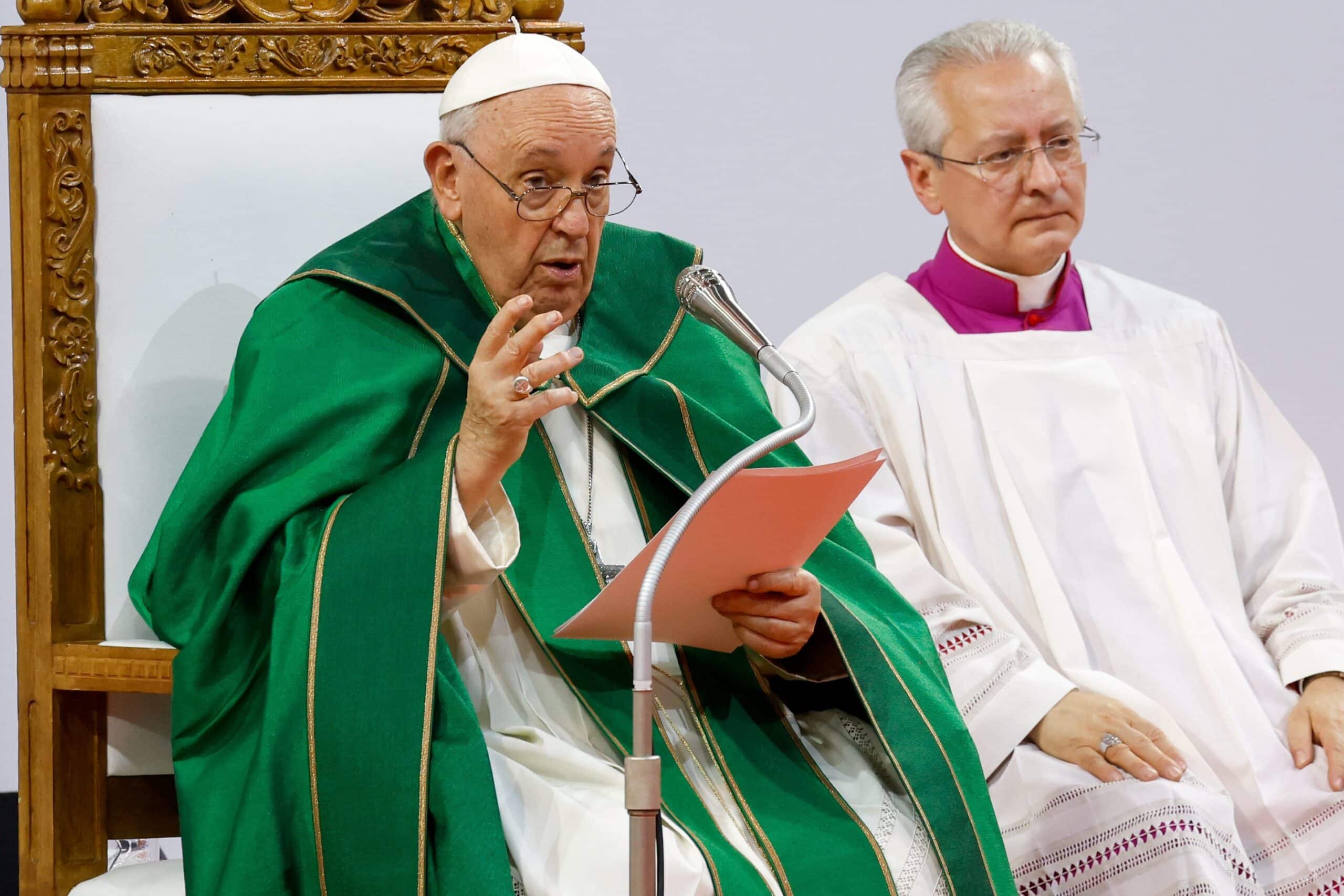 Pope Francis delivers his homily during Mass