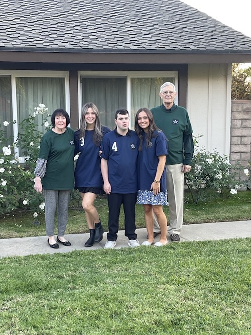 Christopher and sisters with grandparents