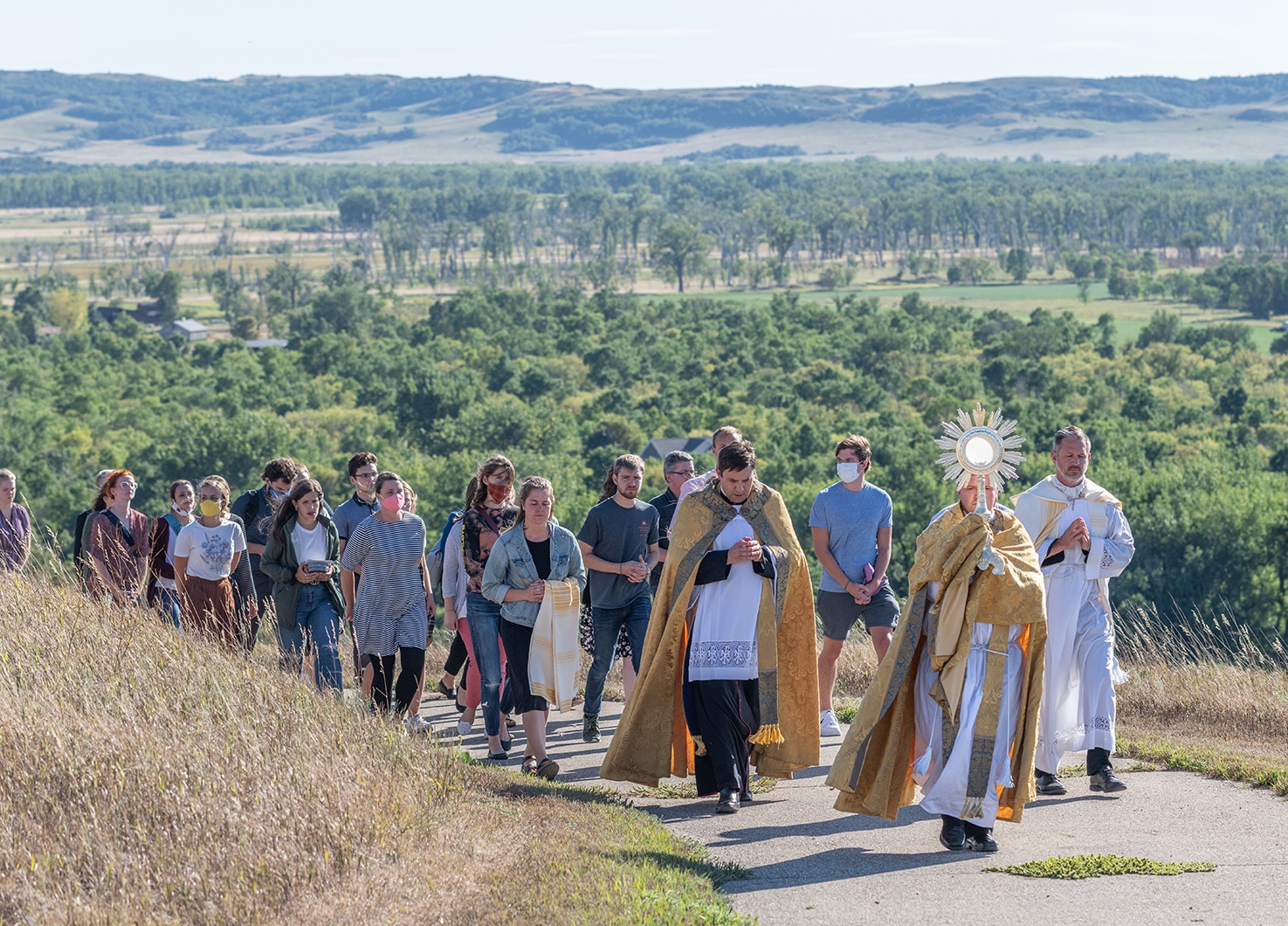 University of Mary Procession for Palm Sunday Mass on Camapus' Sageway Path