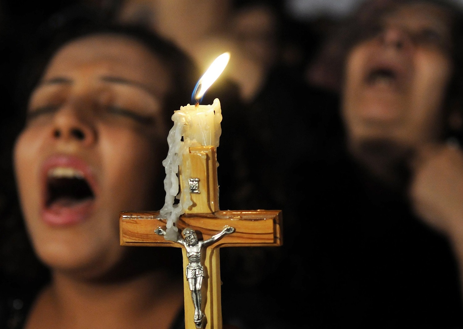COPTIC CHRISTIANS PRAY INSIDE CHURCH IN CAIRO