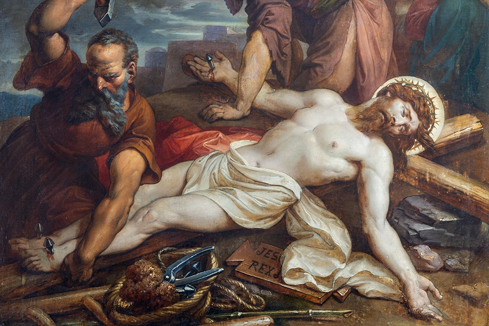 Jesus is nailed to the cross